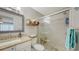 Beautiful bathroom featuring modern fixtures, a spacious shower, and elegant finishes at 1431 57Th W St # 1431, Bradenton, FL 34209