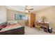 Cozy bedroom featuring a comfy bed and natural lighting at 1431 57Th W St # 1431, Bradenton, FL 34209