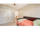 Comfortable bedroom with closet and door to en-suite bathroom at 1431 57Th W St # 1431, Bradenton, FL 34209