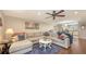 Open concept living area with dining and kitchen areas at 1431 57Th W St # 1431, Bradenton, FL 34209