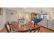 Comfortable dining area adjacent to living room with lots of seating at 1431 57Th W St # 1431, Bradenton, FL 34209