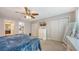 Calming main bedroom featuring a comfortable bed, closet space, and a soothing color palette at 1431 57Th W St # 1431, Bradenton, FL 34209