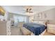 Bright main bedroom with neutral tones, soft carpet, and ample natural light at 1431 57Th W St # 1431, Bradenton, FL 34209