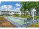 Enjoy shuffleboard in this community space, complete with benches and lush trees, adjacent to condo buildings at 1535 Pleasant Rd # H5, Bradenton, FL 34207