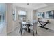 Breakfast nook with a glass round table, seating for four and a beautiful view at 17704 Gawthrop Dr # 102, Bradenton, FL 34211