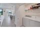Functional laundry room area, offering convenient access to the main living space and outdoor views at 17704 Gawthrop Dr # 102, Bradenton, FL 34211