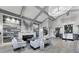Grand lobby with soaring ceilings, modern fireplace, and comfortable seating at 17704 Gawthrop Dr # 102, Bradenton, FL 34211