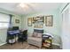 Spare bedroom with a desk, chair, and closet at 18033 Edgewater Dr, Port Charlotte, FL 33948