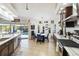 Kitchen with a view to the pool area, marble countertops, and stainless steel appliances at 18033 Edgewater Dr, Port Charlotte, FL 33948