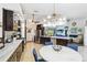 Gourmet kitchen with marble countertops, custom cabinets, stainless steel appliances and island seating at 18033 Edgewater Dr, Port Charlotte, FL 33948