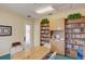 Well-appointed community room with bookshelves, tables, and comfortable seating at 208 Silver Lake Dr # 101, Venice, FL 34292