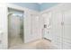 All-white primary bath featuring a glass-enclosed shower and vanity at 2196 Muskogee Trl, Nokomis, FL 34275