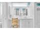 Bright bathroom with vanity and lighted mirror at 2196 Muskogee Trl, Nokomis, FL 34275