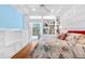 Spacious bedroom with built-in shelving and bench seating at 2196 Muskogee Trl, Nokomis, FL 34275