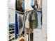 Spacious closet with custom shelving and organized storage for clothing and shoes at 2196 Muskogee Trl, Nokomis, FL 34275