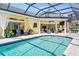 Inviting screened-in pool area with comfortable lounge chairs and a tranquil atmosphere at 2196 Muskogee Trl, Nokomis, FL 34275