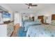 Charming bedroom with twin beds, closet with mirrored doors, and beachy decor at 225 Hourglass Way # 306, Sarasota, FL 34242
