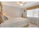 A bright bedroom offers a peaceful retreat with ample natural light and closet space at 2417 Riverbluff Pkwy # 235, Sarasota, FL 34231