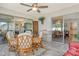 Sunroom boasts serene views and comfortable seating for relaxation at 2417 Riverbluff Pkwy # 235, Sarasota, FL 34231