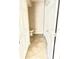 Hallway leading to toilet with closet doors and tiled floor at 2938 Clark Rd # 203, Sarasota, FL 34231