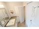 Bathroom featuring granite counters, white tub and shower combo at 3409 Montilla Ct # 8410, Sarasota, FL 34232