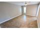 Bright bedroom featuring tile floors, ceiling fan, and neutral walls at 3409 Montilla Ct # 8410, Sarasota, FL 34232