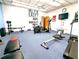 Fitness center with stationary bike, rower, treadmill and free weights at 3409 Montilla Ct # 8410, Sarasota, FL 34232