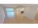 Open-concept living space seamlessly connecting the living room, kitchen, and screened lanai, great for entertaining at 3409 Montilla Ct # 8410, Sarasota, FL 34232