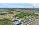 Breathtaking aerial view of the community park featuring lush greenery and recreational facilities at 3443 74Th Avenue E Cir, Sarasota, FL 34243