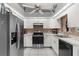 Well-equipped kitchen with stainless steel appliances and ample counter space at 3459 Lotus Rd, North Port, FL 34291