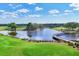 Beautiful aerial view of the golf course and the wooden bridge, showcasing community's scenic landscapes at 3519 Founders Club Dr, Sarasota, FL 34240