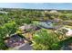 Picturesque community amenities with tennis courts, a playground, and a community clubhouse at 3519 Founders Club Dr, Sarasota, FL 34240
