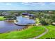 Scenic aerial view of the community's lush landscaping, water features, and impressive residential homes at 3519 Founders Club Dr, Sarasota, FL 34240