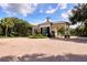 Welcoming community entrance gate with manicured landscaping and brick-paved entrance at 3519 Founders Club Dr, Sarasota, FL 34240