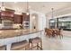 Cozy kitchen nook with a sunlit breakfast table, perfect for casual dining and morning coffee at 3519 Founders Club Dr, Sarasota, FL 34240