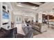 Open-concept layout featuring living room, kitchen, and dining area, perfect for entertaining at 3519 Founders Club Dr, Sarasota, FL 34240