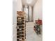 Wine cellar with racking, beverage cooler, and space for storing vintage wines at 3519 Founders Club Dr, Sarasota, FL 34240