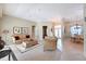 Inviting living room with neutral tones, comfortable seating, and an open layout for easy entertaining at 4412 Wolf Ridge Xing, Parrish, FL 34219