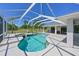 Beautiful enclosed pool with beautiful blue water, spa, and large patio at 4412 Wolf Ridge Xing, Parrish, FL 34219