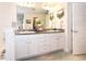 Spacious bathroom with dual sinks and granite countertops on white cabinets at 4509 95Th E Ter, Parrish, FL 34219