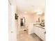Bright bathroom features granite counters, white cabinets, and tiled floors at 4509 95Th E Ter, Parrish, FL 34219