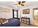 Bedroom with ceiling fan, carpet, closet and Toy Story decor at 4509 95Th E Ter, Parrish, FL 34219
