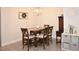 Charming dining room with stylish furniture, neutral decor, and warm lighting at 4509 95Th E Ter, Parrish, FL 34219