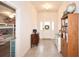 Welcoming foyer featuring neutral tile, ample natural light and views into the adjoining rooms at 4509 95Th E Ter, Parrish, FL 34219