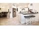 Open kitchen featuring stainless steel appliances, granite countertops, breakfast bar and tile flooring at 4509 95Th E Ter, Parrish, FL 34219