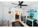 Enclosed patio with ceiling fan and view to the living room at 4509 95Th E Ter, Parrish, FL 34219