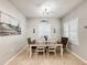 Dining room with large shuttered window at 4578 Cedar Brush Ter, Sarasota, FL 34243