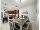 Bright dining area with seating and kitchen view at 4578 Cedar Brush Ter, Sarasota, FL 34243