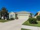 Charming single-story home with a well-maintained lawn and a two-car garage at 4578 Cedar Brush Ter, Sarasota, FL 34243