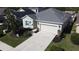 Charming single-story home featuring a two-car garage, well-maintained lawn, and tasteful landscaping at 4578 Cedar Brush Ter, Sarasota, FL 34243